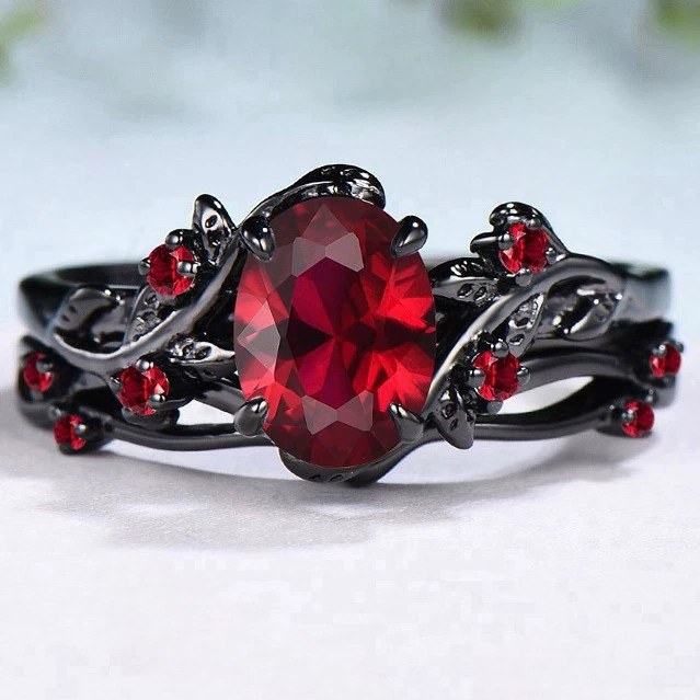 Sanjie cross-border European and American retro foreign trade hot selling ruby ring gun black rose branches cross pair ring