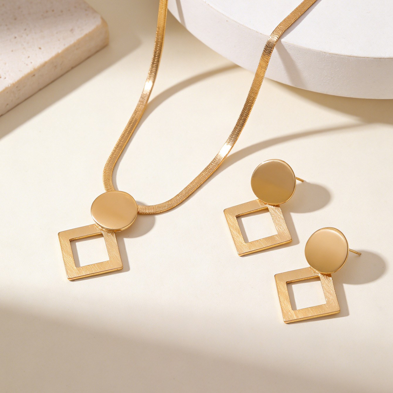 Prismatic pendant necklace + earrings - gold