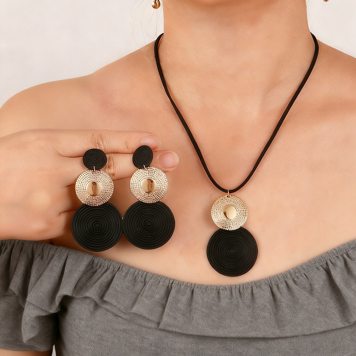 Black/gold disc earrings + necklace set
