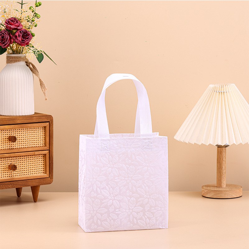 White four-leaf clover; 20*18*8; patterned non-woven fabric